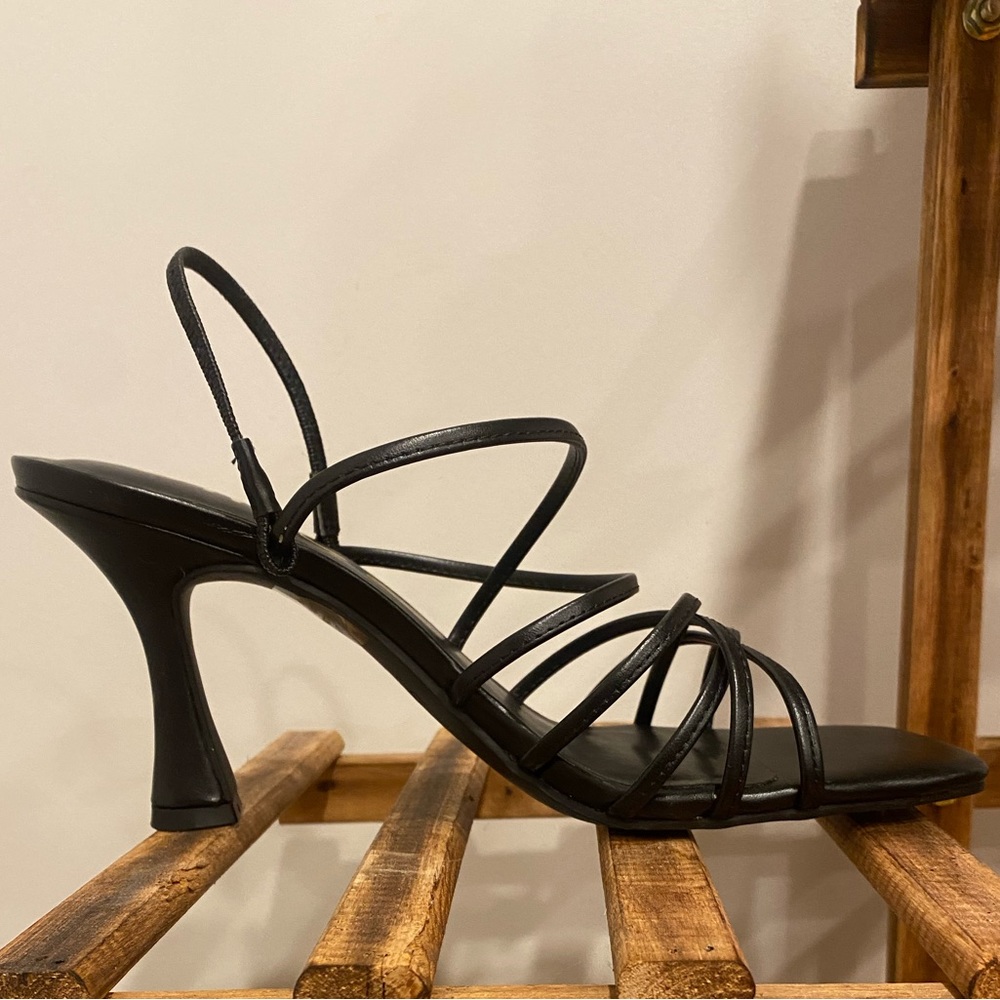Cute strappy black sandals with fun heel